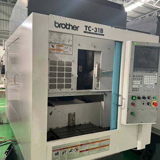 Brother Drill Tap Center TC 31B Manufacturers, Suppliers in Ahmedabad