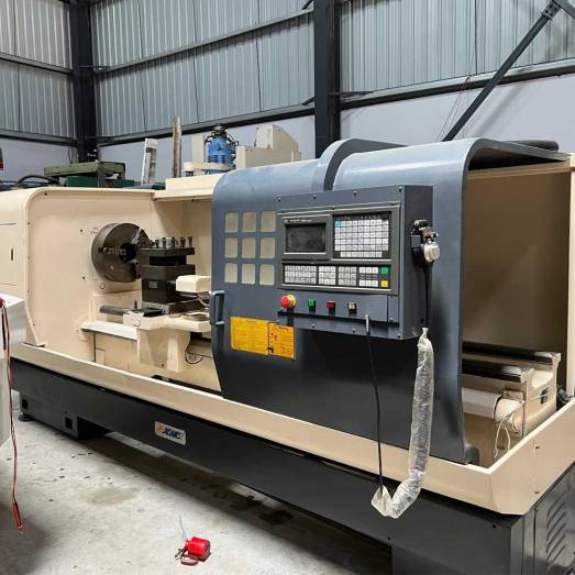 Heavy Duty Flat Bed Cnc Lathes DMTG Manufacturers, Suppliers in Ahmedabad
